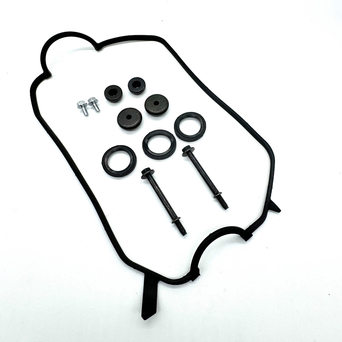 Valve Cover Gaskets & Bolts Complete Kit featuring black rubber gaskets, bolts, and washers, ideal for engine sealing.