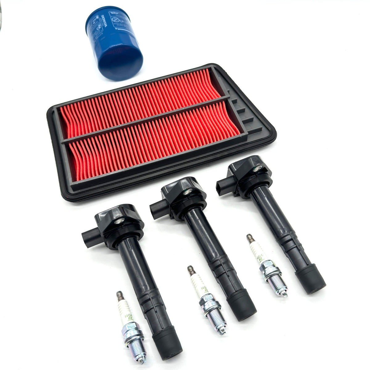 Filter & Ignition Set for Honda Acty Truck HA8, HA9 Models 2009-2022 featuring a red air filter, blue oil filter, and black ignition coils with spark plugs.