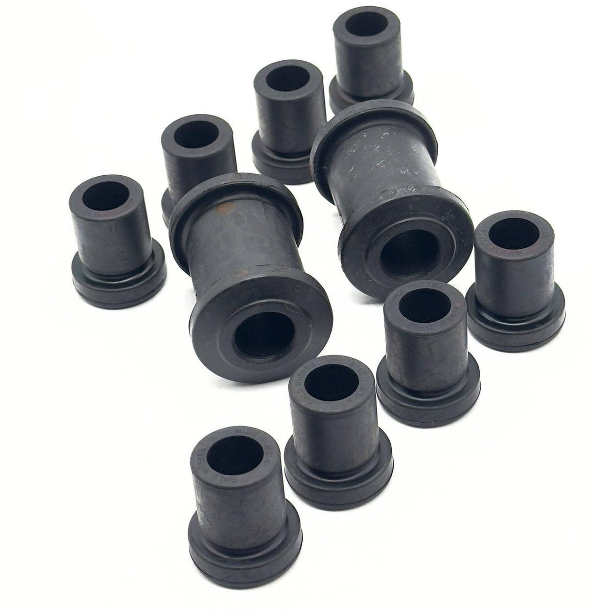 Leaf Spring Bushing Kit for Honda Acty Truck Models HA3, HA4 (1990-1999), featuring durable black bushings for front, rear, left, and right.