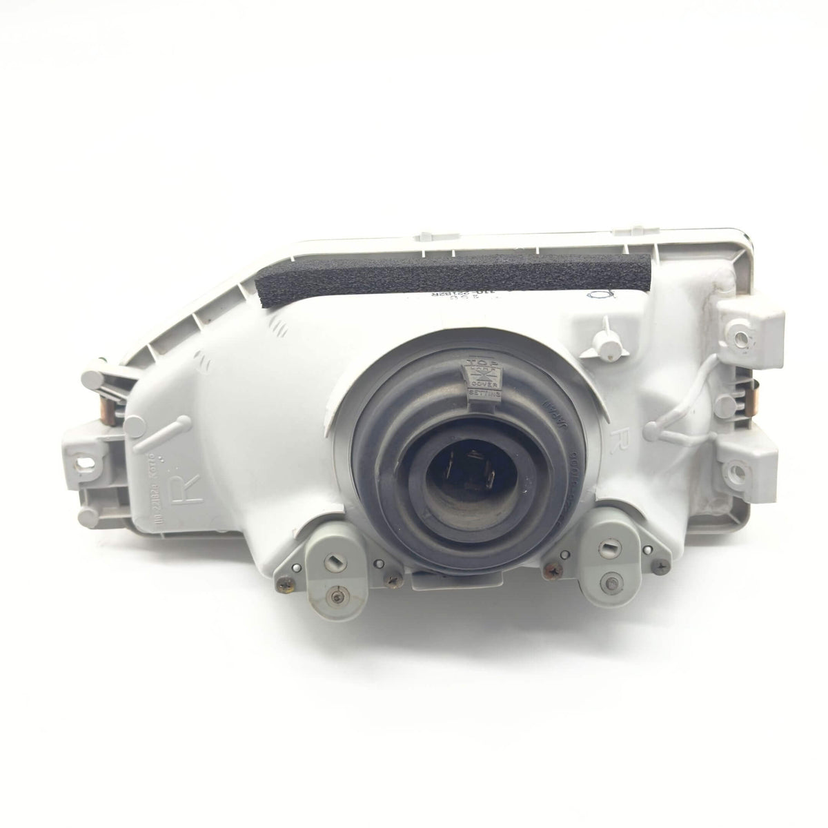 Headlight for Honda Acty Truck Models HA3, HA4 (1990-1993) featuring a right-side driver design with durable housing and mounting components.