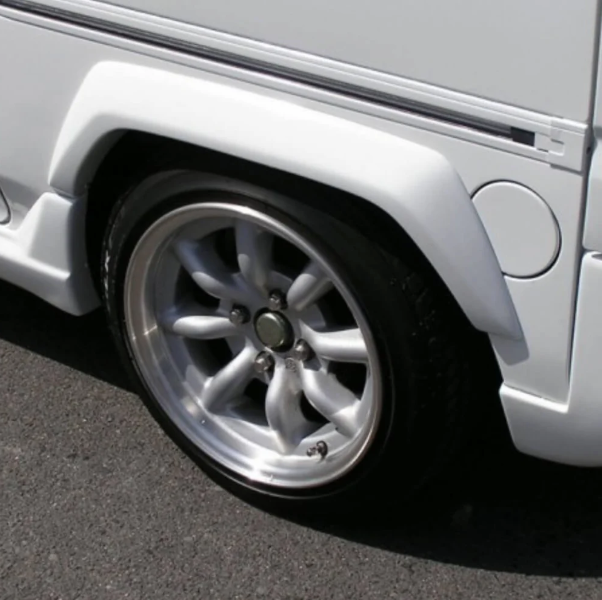 Mag Factory body kit for Honda Acty Van HH3, HH4 models (1990-1999), featuring sleek fender flares and custom styling for an enhanced aerodynamic look.
