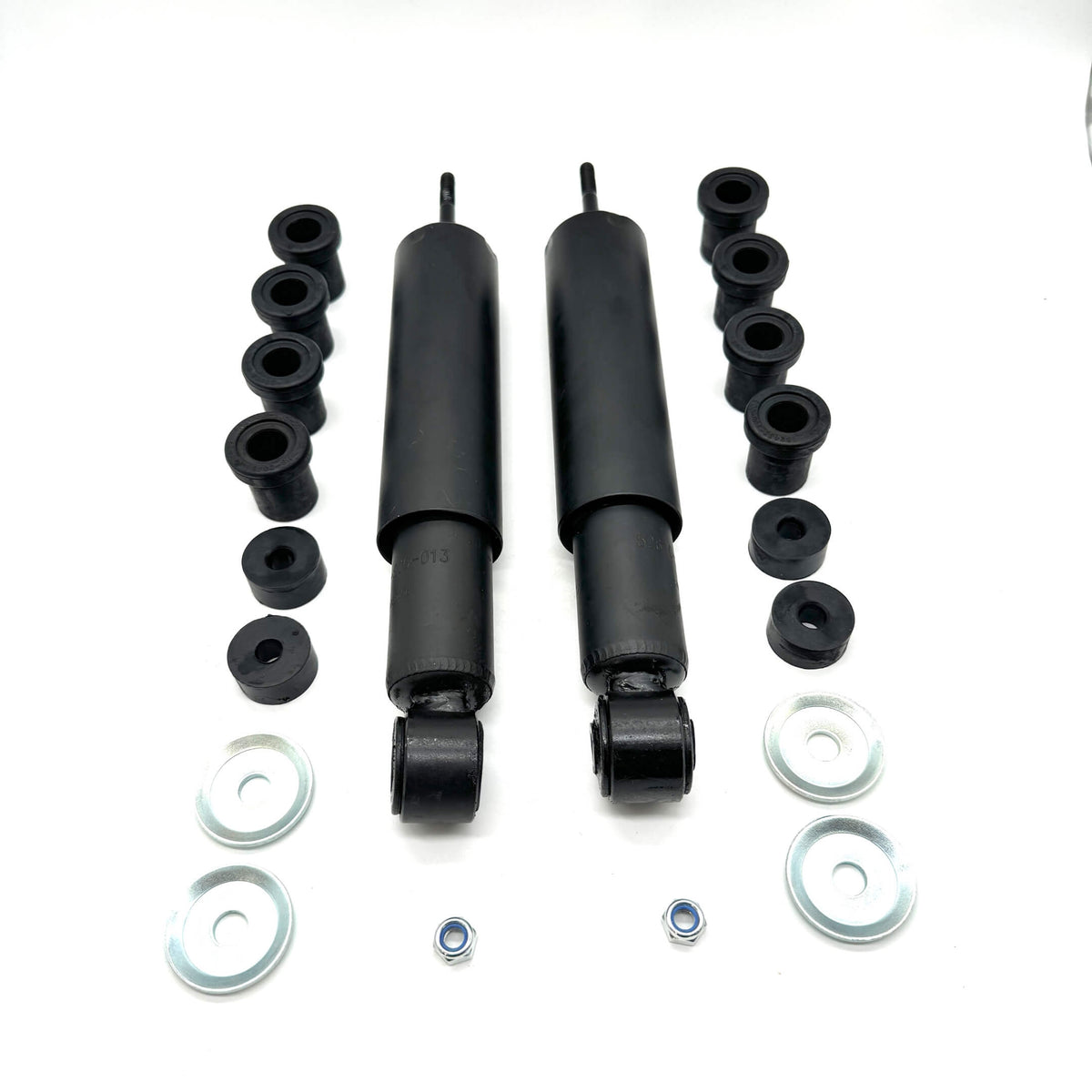 Complete rear suspension kit for Honda Acty Van HH3, HH4 showing bushings, shocks, and hardware isolated on white background.