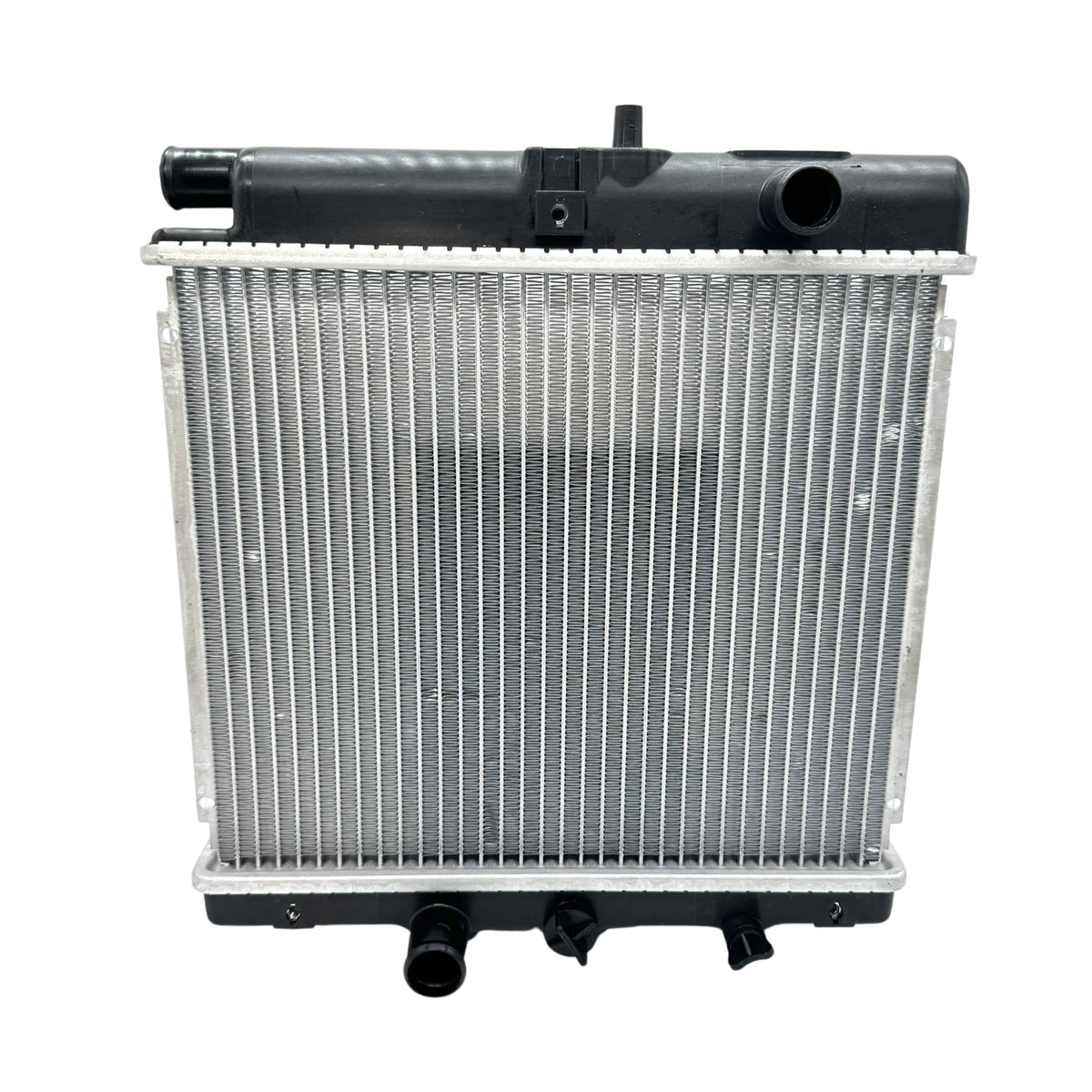 Rear perspective of a gently used radiator assembly for Honda Acty HA3, HA4 models, highlighting the intact connectors and tubing.