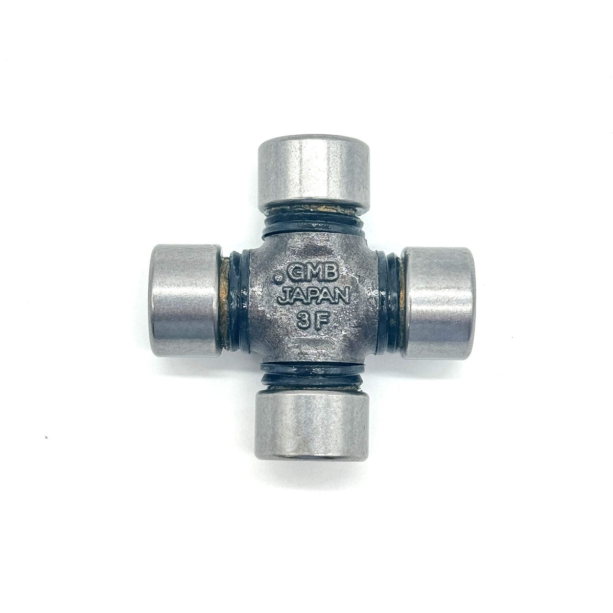Detailed side view of the U Joint for Honda Acty Truck HA4 (1990-1999), showcasing the robust build and exact fit for drive shaft and propeller shaft connections.