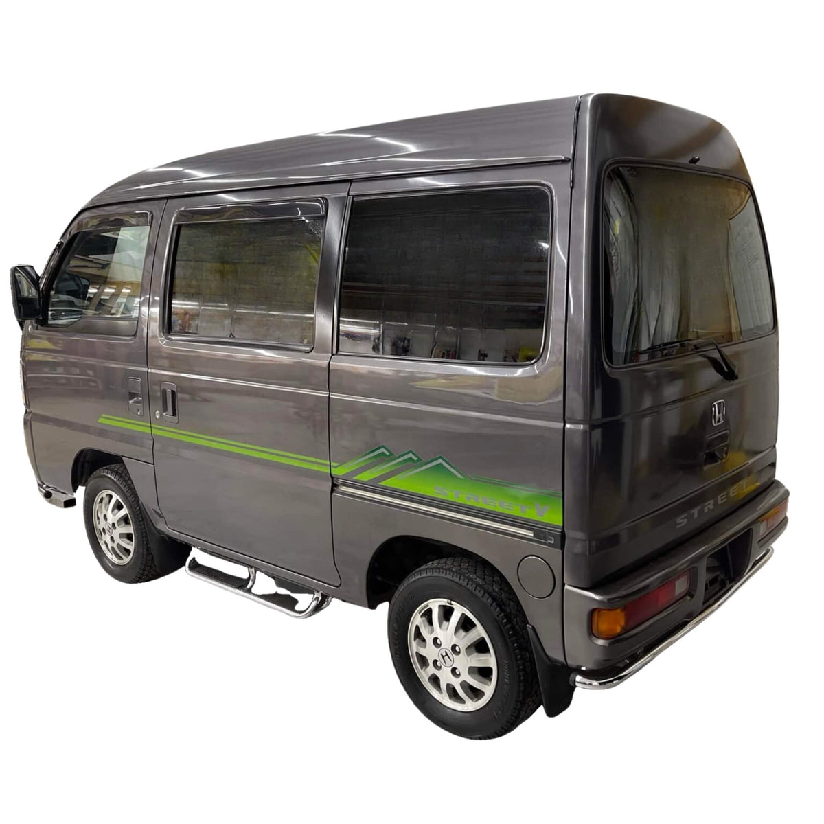 Close-up of the Green Street V side decal on a Honda Street Van HH3 or HH4 model, emphasizing the vibrant color and sharp design for a retro Japanese kei van look.