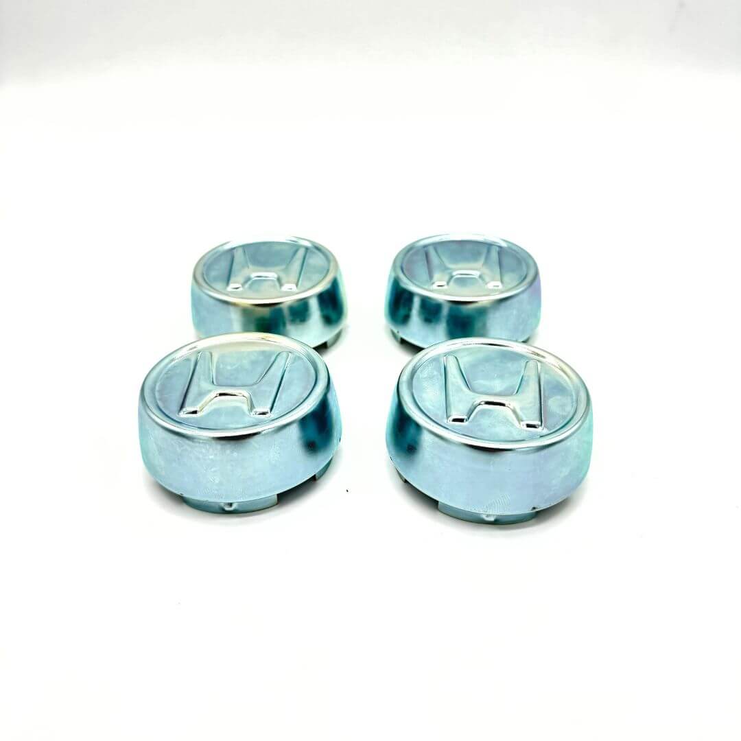 Honda Acty Van Wheel Center Cap Set: A set of four metal caps, engineered for HH3 and HH4 models (1990-1999), providing a secure fit, improving wheel aesthetics, and featuring the distinctive 'H' logo for brand consistency.