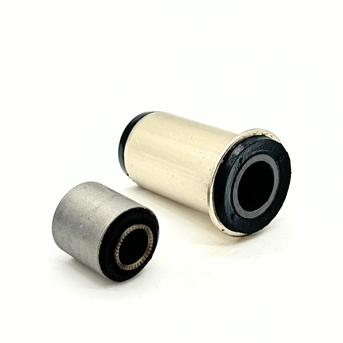 Honda Acty Van HH3, HH4 Center Steering Link Bushing Kit - Side view showcasing durable rubber and metal construction for enhanced steering stability.