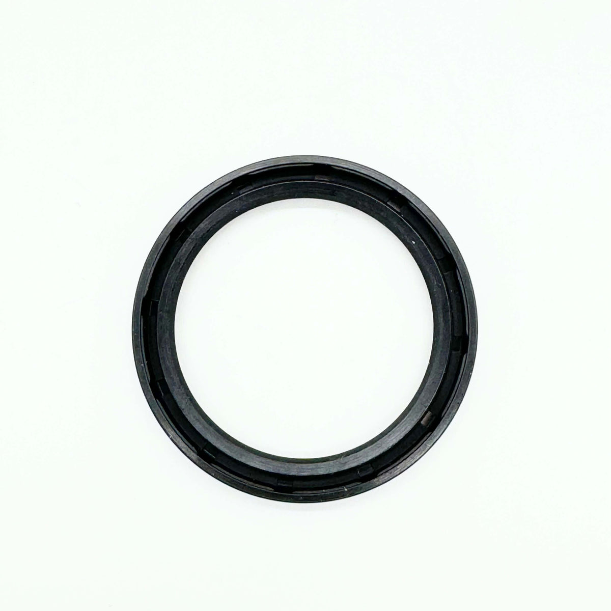 Side view of the rear wheel bearing rubber seal, part of Honda Acty HH3, HH4 1990-1999 repair kit, showing detailed grooves
