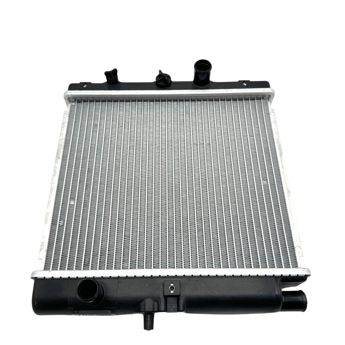 Side view of a Honda Acty HH3, HH4 radiator assembly, slightly used, with focus on side mounting brackets and clean fins.