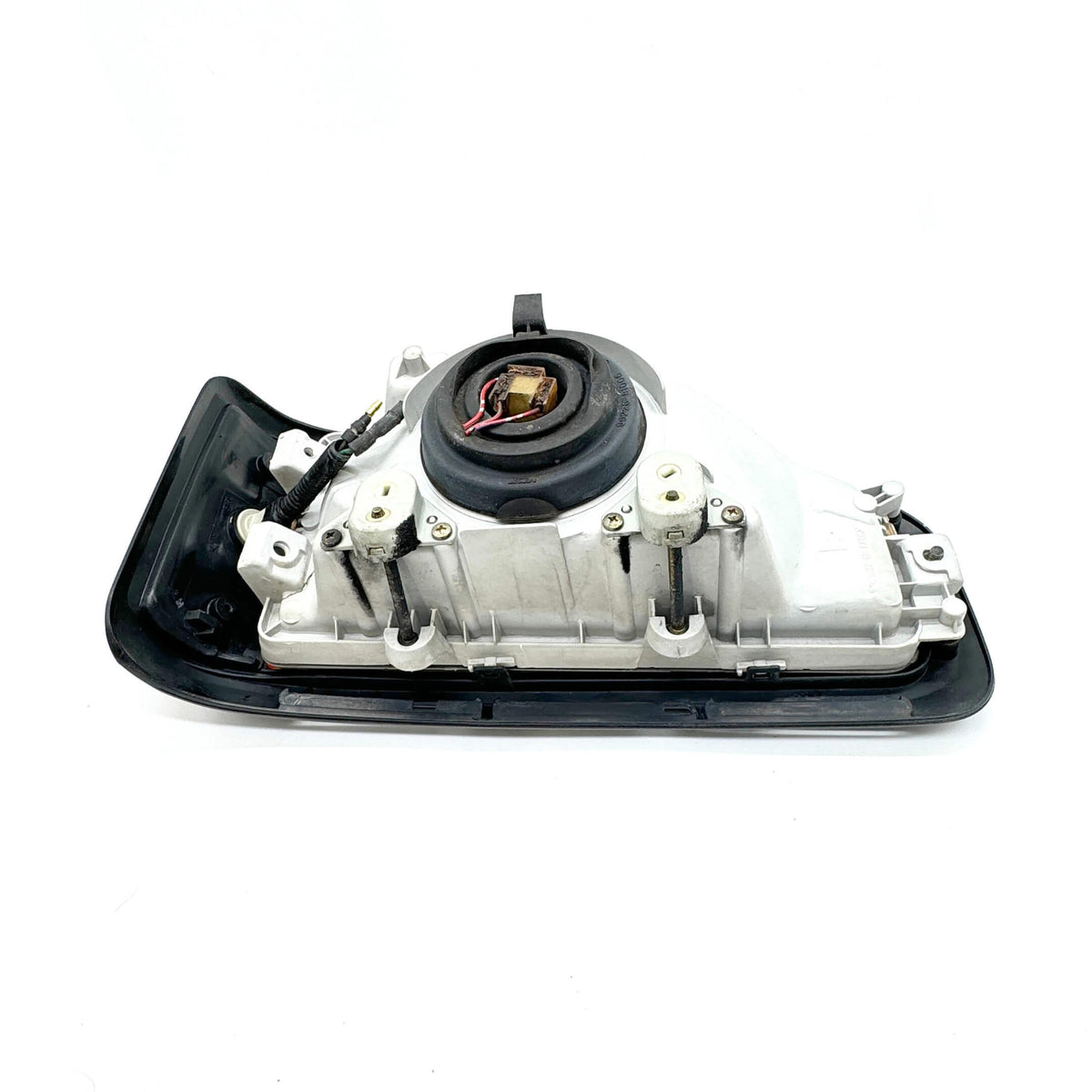 Detailed rear view of Left Headlight Assembly for Honda Acty Van HH3, HH4 models (1990-1993) showing wiring harness and connectors