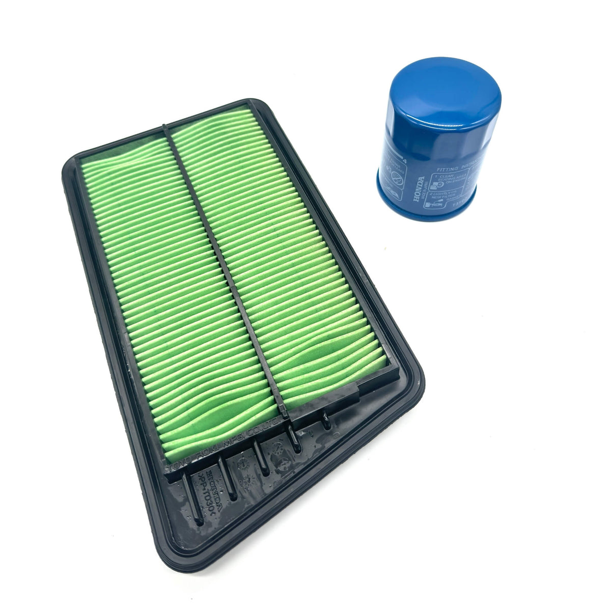 Genuine Honda 2 Piece Filter Package for Honda Acty Truck HA8, HA9 Models 2009-2022, featuring a green air filter and blue oil filter.