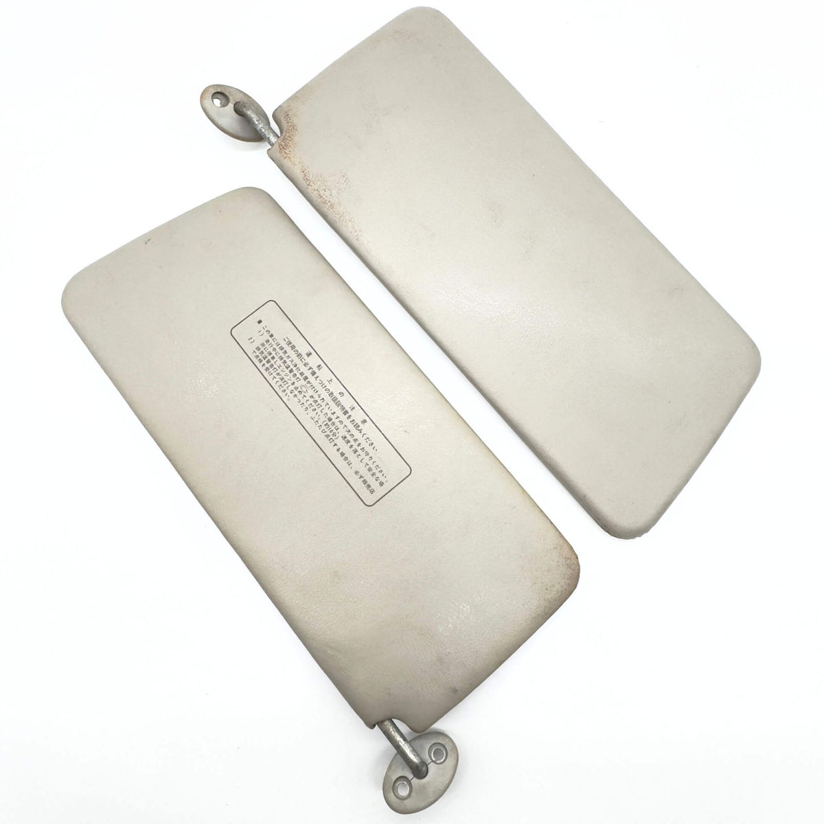 Sun Visors Set for Honda Acty Truck Models HA3, HA4 (1990-1999) featuring a used, beige finish with mounting brackets.